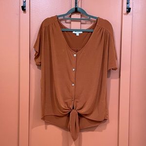 Rust orange short sleeve top with button detail